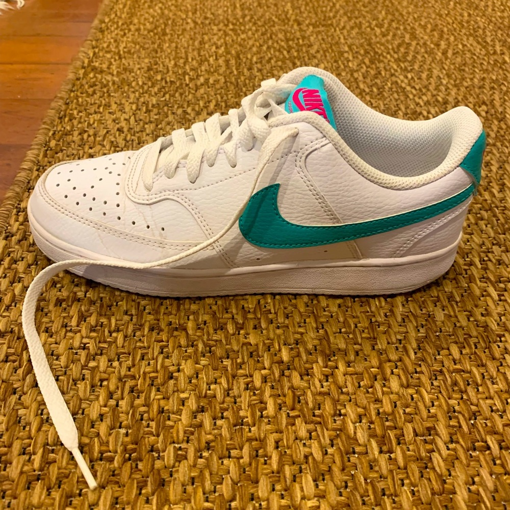Women’s Nike court vision shoes.